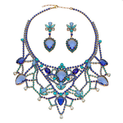 Blue rhinestone necklace and earrings in design like crystal lace