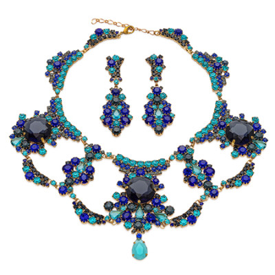 Costume jewelry necklace and earrings with blue rhinestones