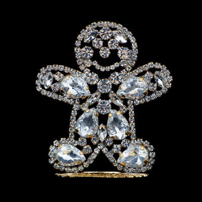 Handcrafted decorative gingerbread man made of clear rhinestones.
