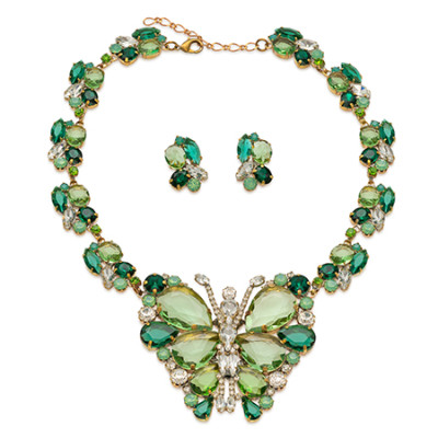 Rhinestone necklace and earrings set featuring a green crystal butterfly