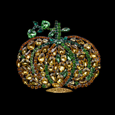 Wide rhinestone pumpkin made of mixed-size gems, sparkling and elegant.