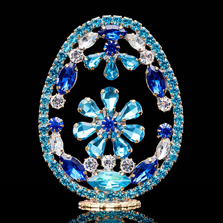 Luxurious rhinestone Easter egg with clear and blue crystal.