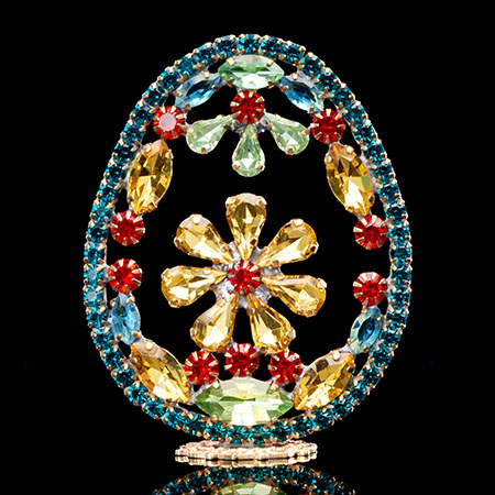 Luxurious rhinestone Easter egg with assorted crystals.