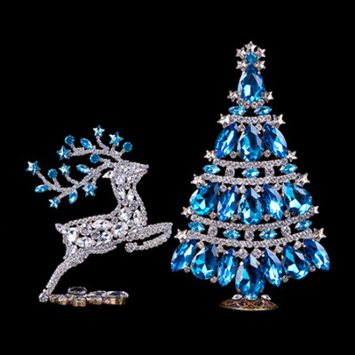 Christmas tree and reindeer from clear and blue rhinestones.
