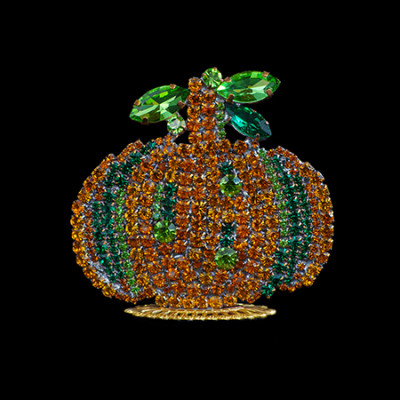Classic pumpkin shape covered in small rhinestones for a dense glittery look.