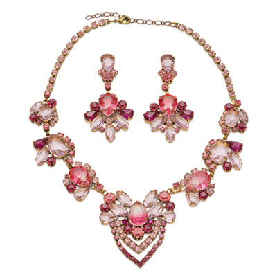 Set of rhinestone necklace and earrings with pink crystals