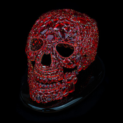Artistic red skull made from intricately placed rhinestones