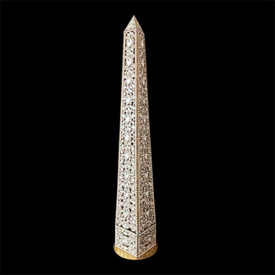 Rhinestone decorative obelisk with crystal sparkle.