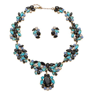 Rhinestone necklace and earrings with a bold black central stone