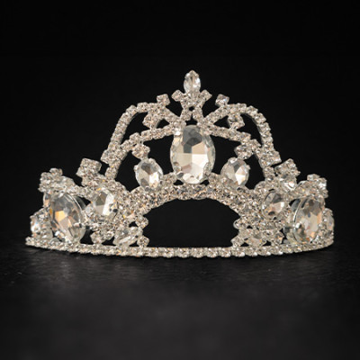Silver crown tiara featuring a large central crystal surrounded by symmetrical patterns of smaller clear rhinestones.