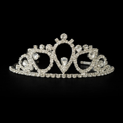 Silver tiara with a clear crystals and a prominent central stone set in a polished metal frame.
