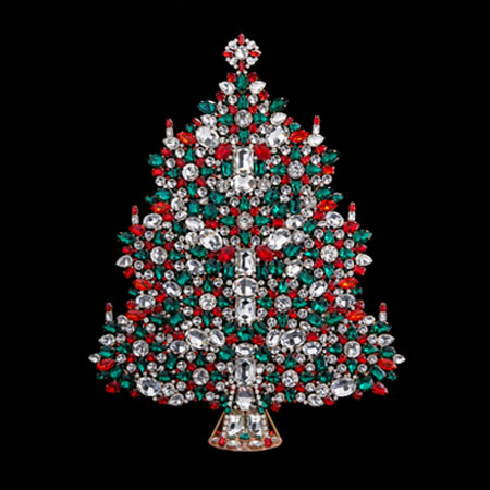 Bountiful Christmas tree, handcrafted with tree decorations.