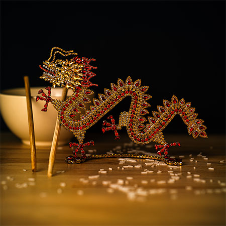 Red and gold dragon ornament from rhinestones