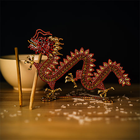 Gold and red dragon ornament from rhinestones