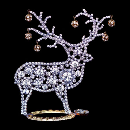 Reindeer with adorensed antlers - decoration for Christmas.