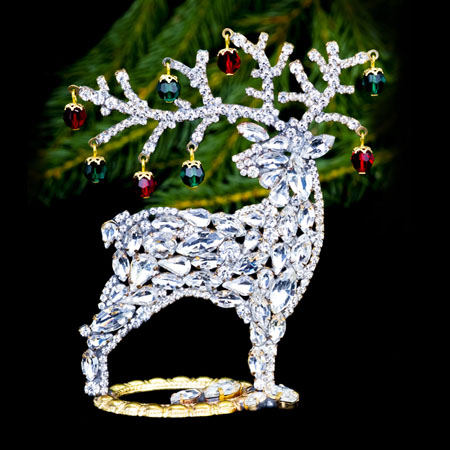 Decorating for Christmas - reindeer with colored rhinestones.