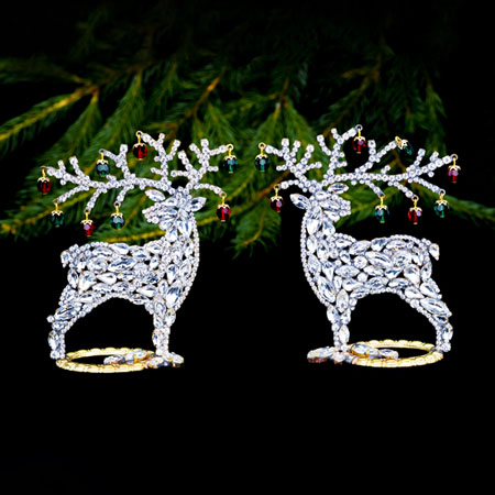 Decorating for Christmas - reindeers with colored rhinestones.