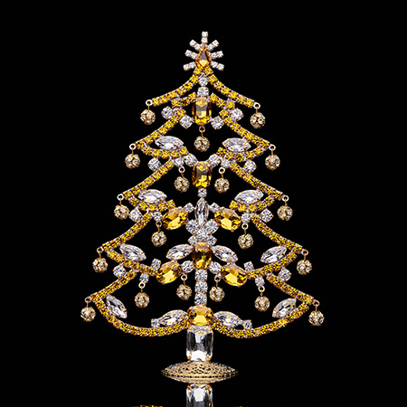Crystalline Christmas tree decorated from yellow rhinestones