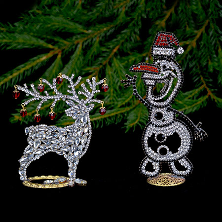 Christmas snowman and reindeer made from clear rhinestones.