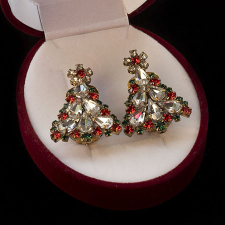 Clip-on earrings with teardrops and small cut rhinestones.