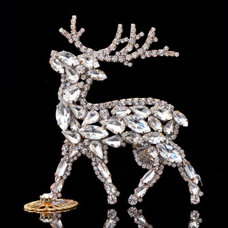 Dashing reindeer - Christmas decoration with clear rhinestones. 