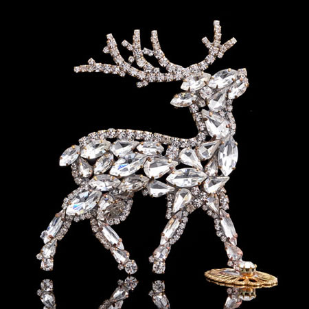 Dashing reindeer - Christmas decoration with clear rhinestones.