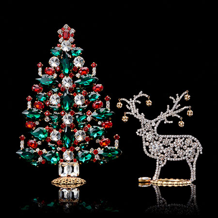 Festive table top Vintage Christmas tree and clear reindeer.