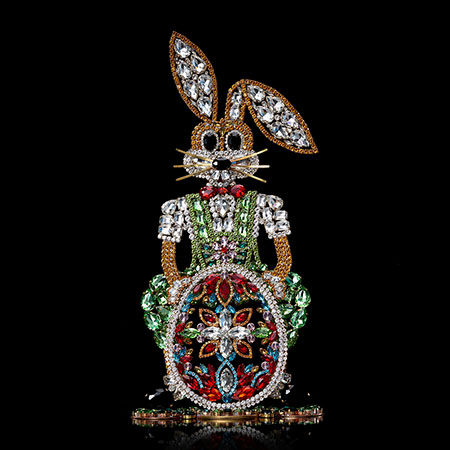 Rhinestone Easter rabbit with multi-colored Easter egg.