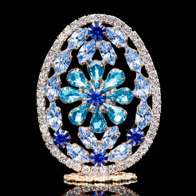 Floral design Easter egg in blue colored rhinestones.