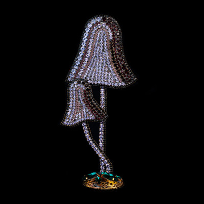 A pair of handmade lilac rhinestone mushroom decorations.