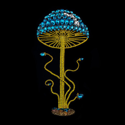 Exclusive gold and aqua mushroom decoration from rhinestones.