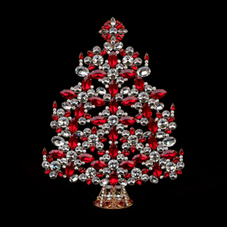 Vintage Czech tabletop Xmas tree with red glass ornaments.