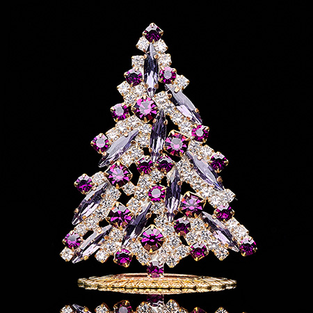 Magical tabletop Christmas tree handcrafted with purple rhinestones