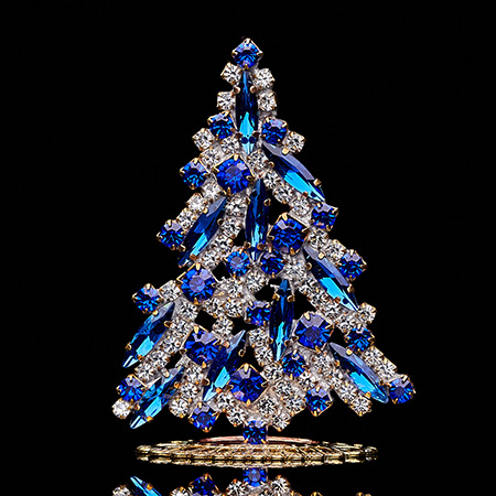 Magical tabletop Christmas tree handcrafted with blue rhinestones