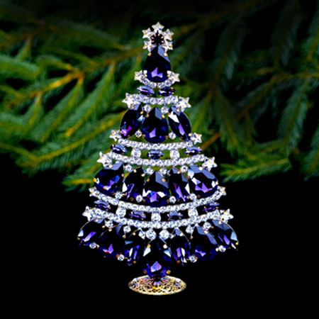 Pretty Christmas tree handcrafted with purple rhinestones.