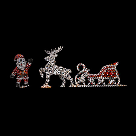 Christmas decoration of Santa, valiant reindeer and splendid sleigh.