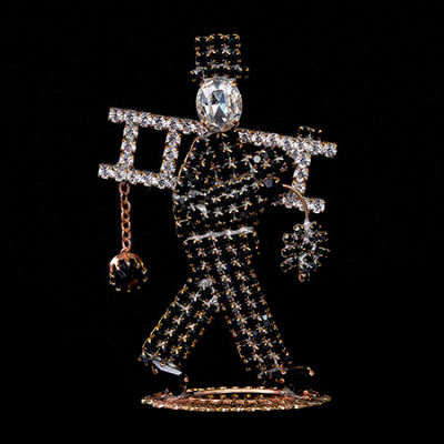 Handmade chimney sweep figure from black and clear rhinestones.