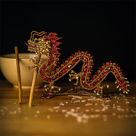 Rhinestone chinese dragon decoration. Red and gold crystals.