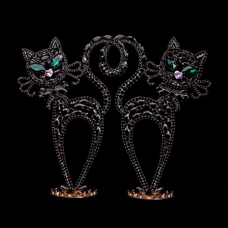 Rhinestones twin cats decoration handmade from black crystals .