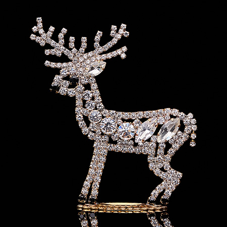 Twinkling reindeer - left facing tabletop Christmas decoration.