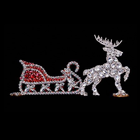 Czech handmade Christmas decoration of reindeer with sleigh.