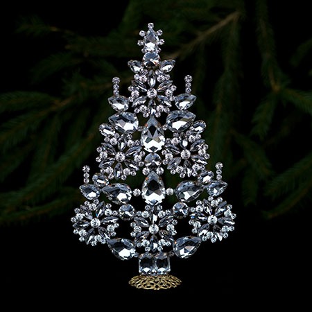 Handcrafted Christmas tree decorated with clear crystals.