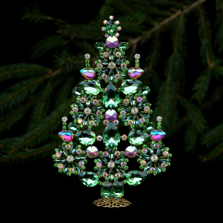 Amazing handcrafted Christmas tree with ornaments in green crystals.